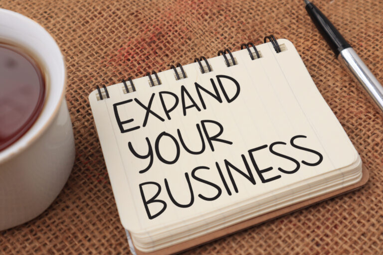 Expand,Your,Business,,Text,Words,Typography,Written,On,Book,Against